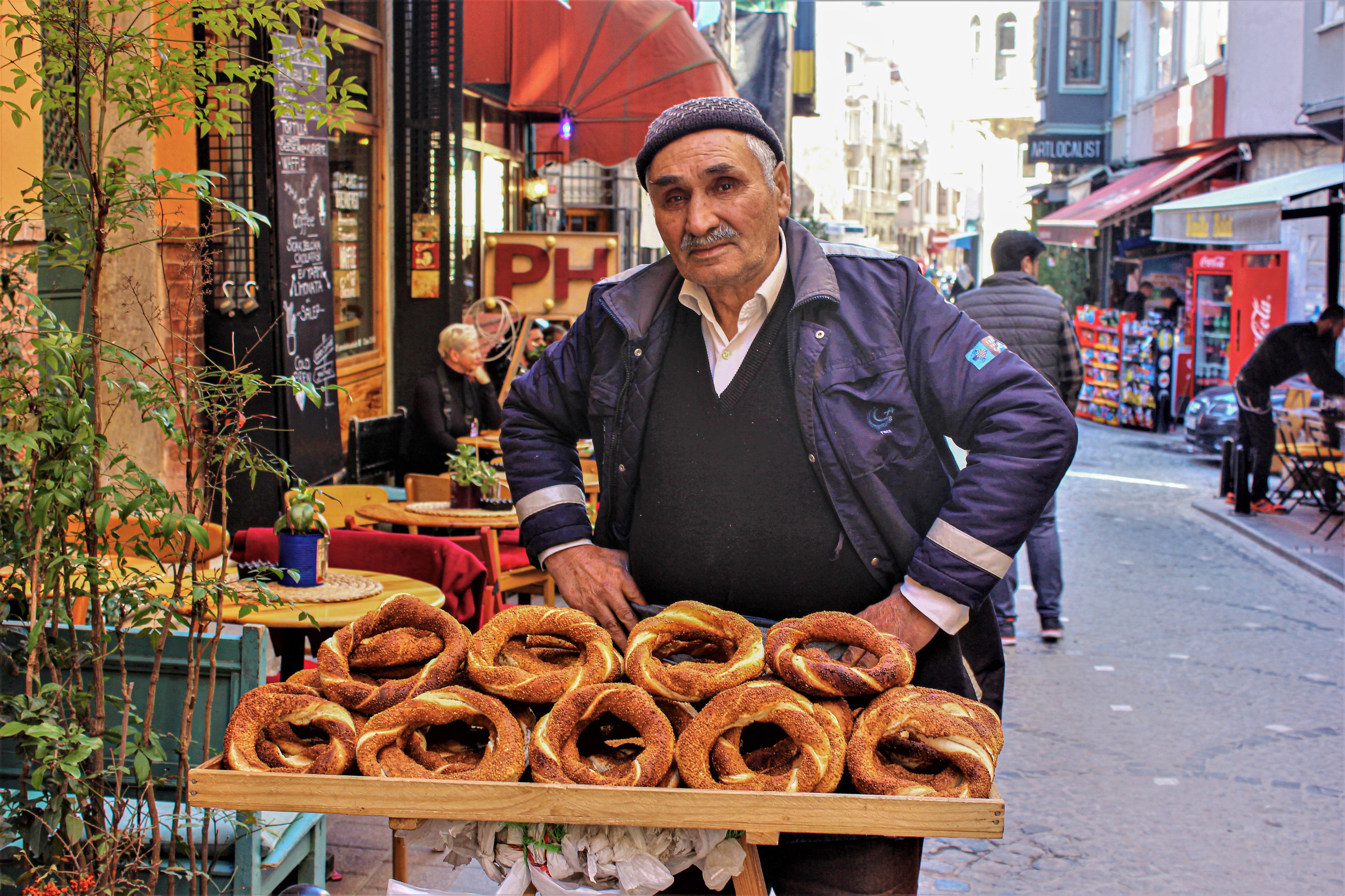 Street Vendor Selling Fresh Simit in Istanbul · Free Stock Photo