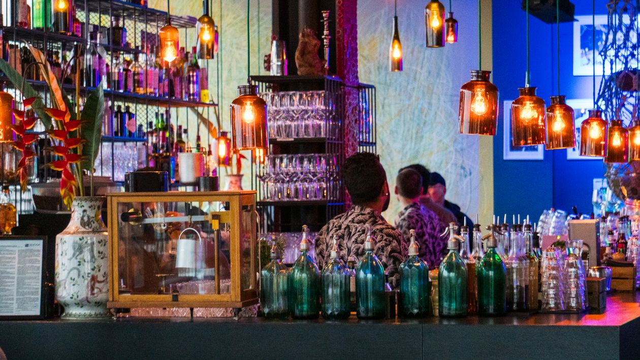 Vibrant Bar Interior with Colorful Lighting · Free Stock Photo