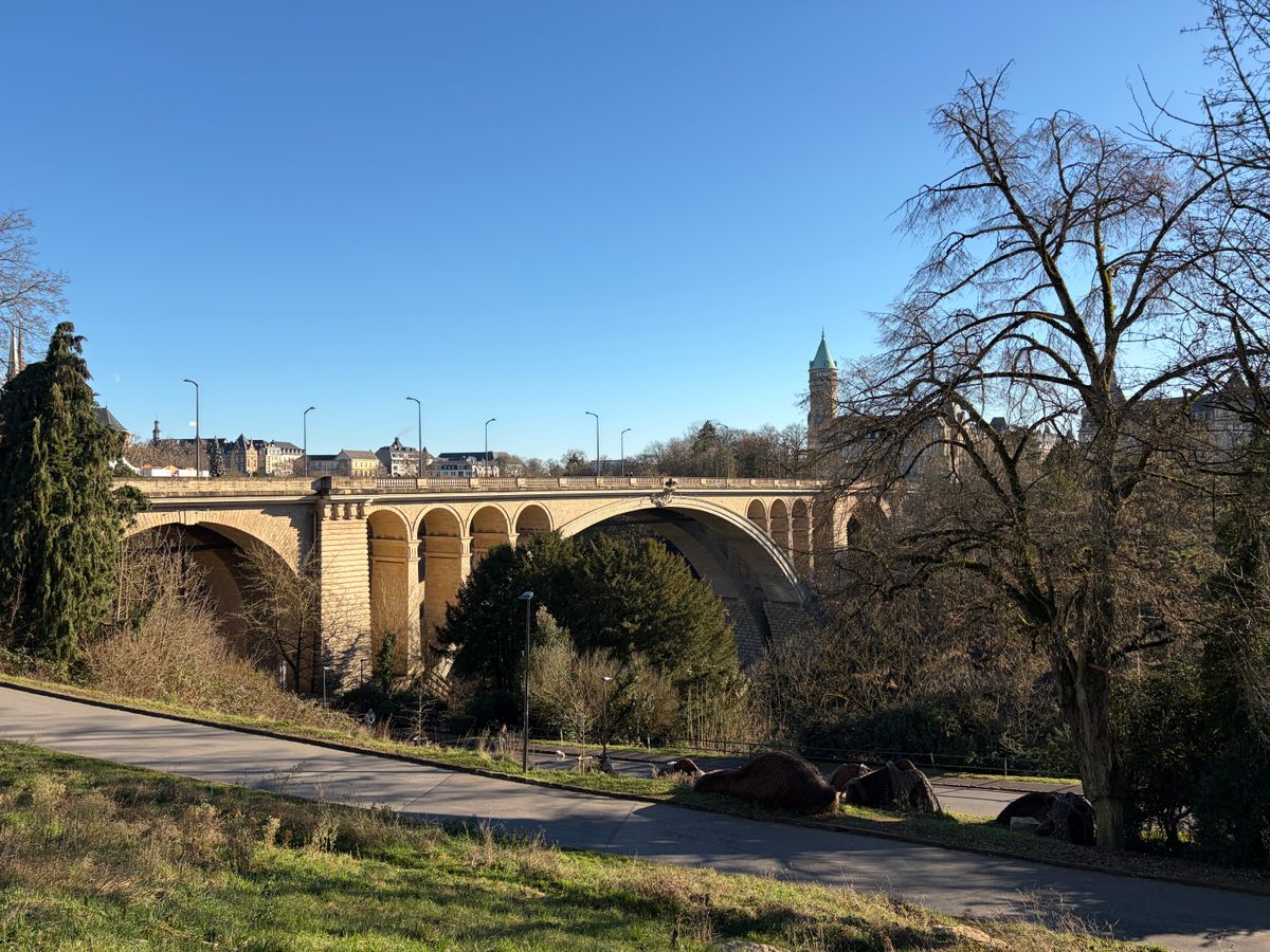 Adolphe Bridge and the old town of Luxembourg City under a clear sky