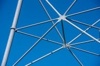 Modern Steel Structure Against Blue Sky