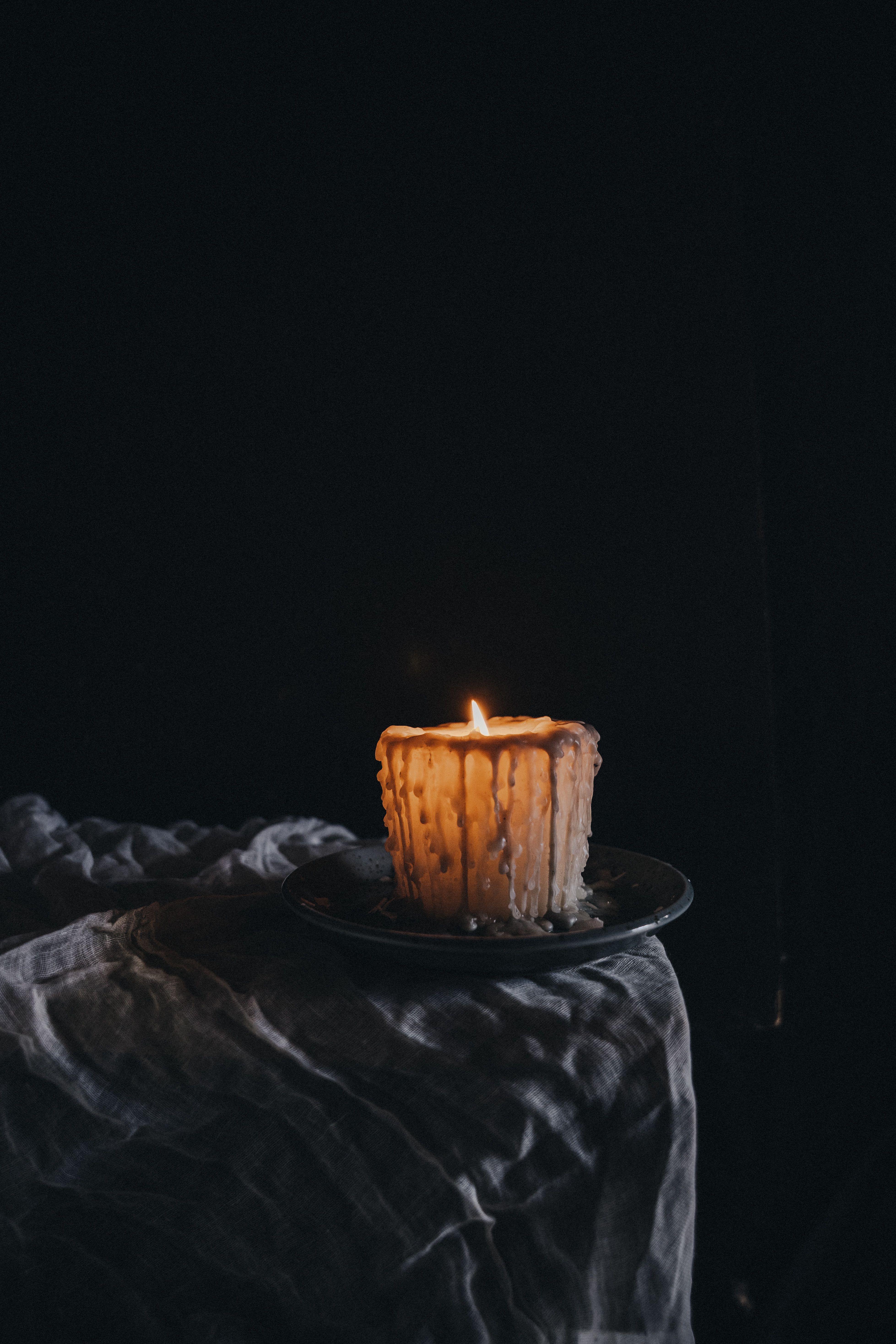 How to Remove Candle Wax From Fabric and Hard Surfaces