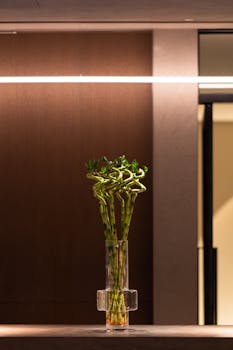 Stylish bamboo arrangement in a modern Tokyo restaurant interior.