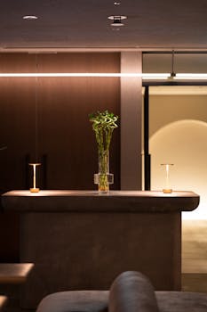 Sophisticated minimalist interior with ambient lighting in luxury Tokyo restaurant.