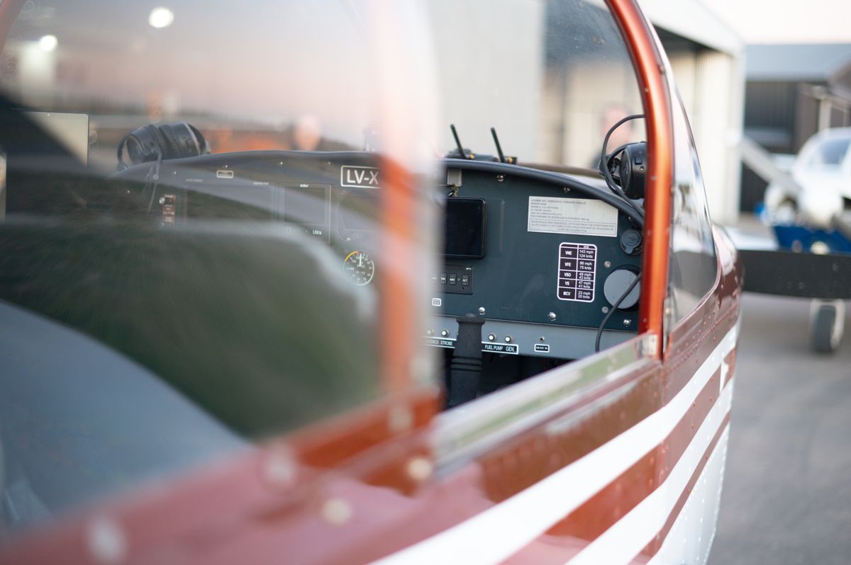 Cessna 172 Skyhawk parked on ramp at a small general aviation airport on a clear day