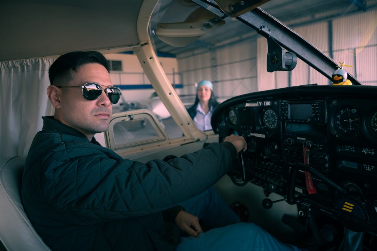 GA pilot communicating with ATC on aircraft radio in cockpit