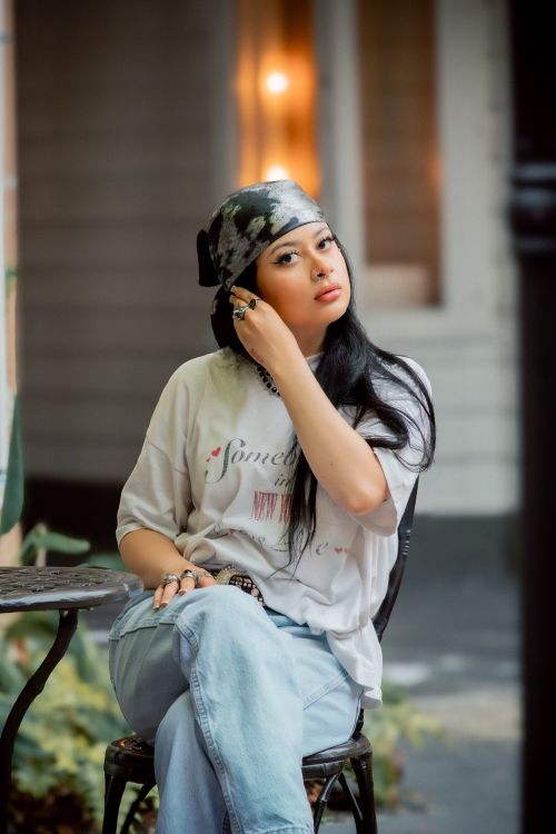 Stylish Woman Posing Outdoors in Casual Attire · Free Stock Photo