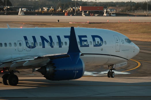 United Airlines aircraft on runway, Washington D.C. airport.
