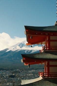 Stunning view of Chureito Pagoda with snow-capped Mount Fuji in the background.