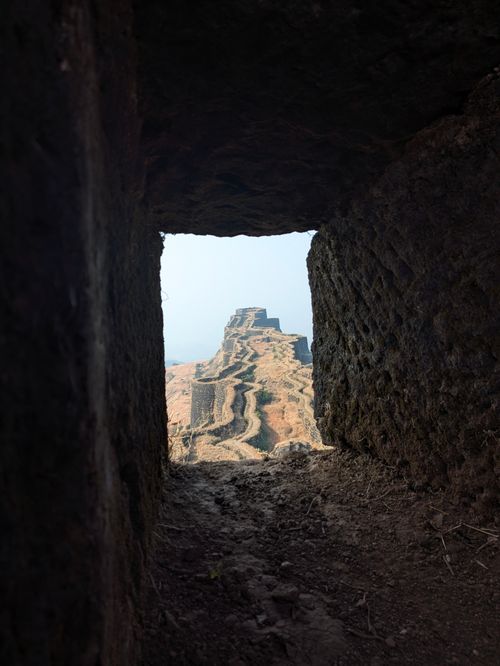 Free Discover the ancient fort ruins through a stone window, offering a unique historical perspective. Stock Photo