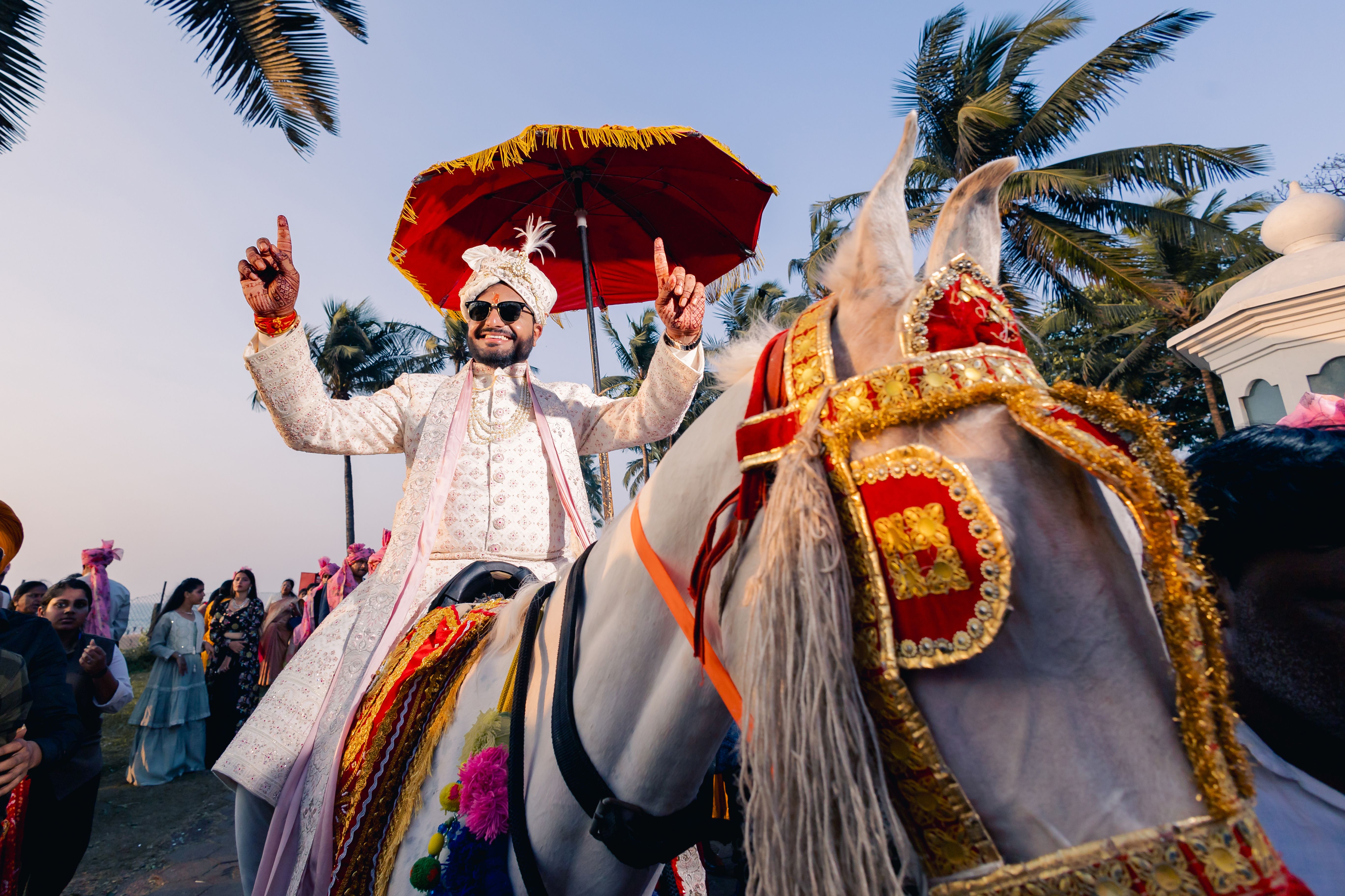 Vibrant Indian Wedding Procession with Groom on Horse · Free Stock Photo