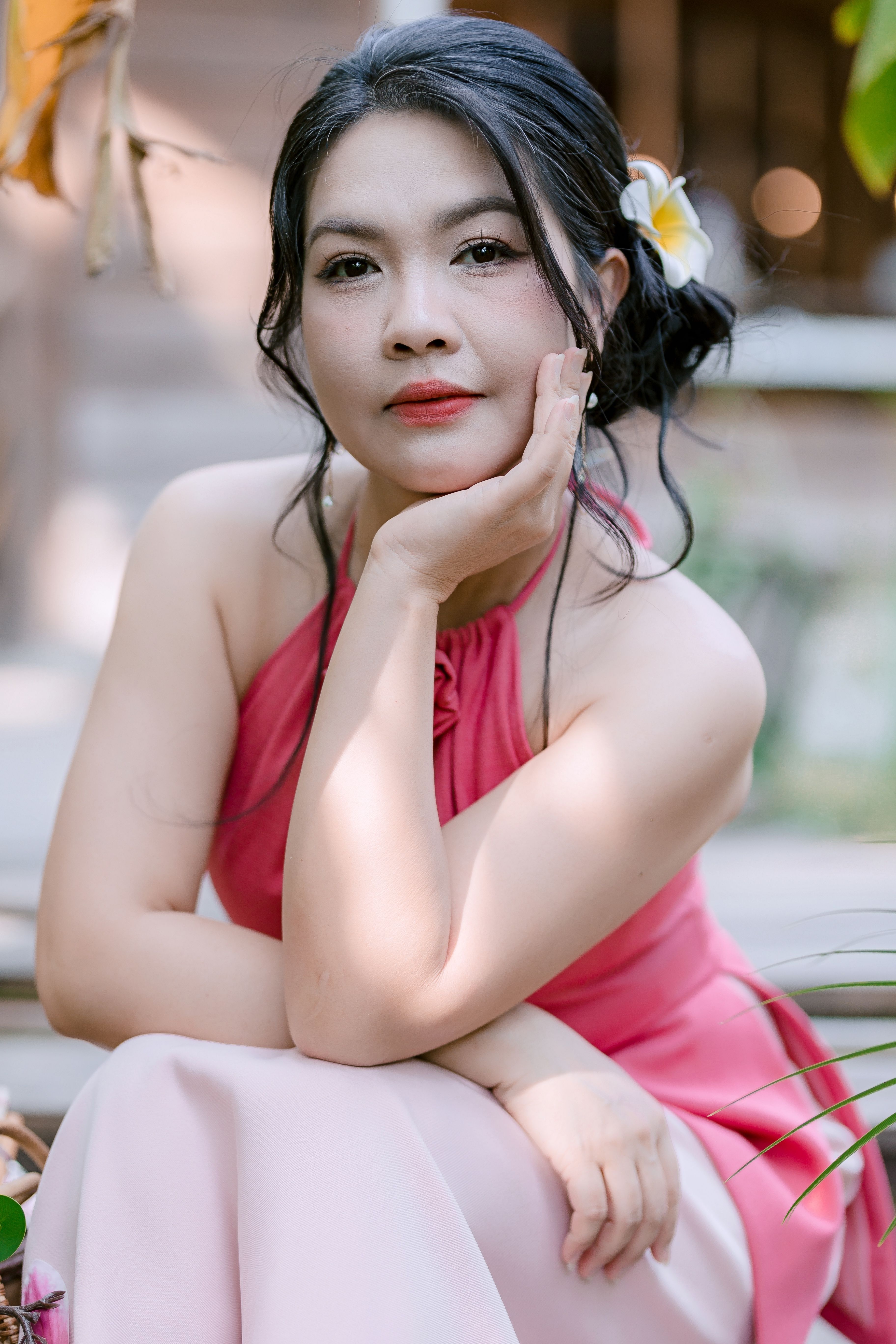 Elegant Portrait of a Woman in Pink Dress Outdoors · Free Stock Photo