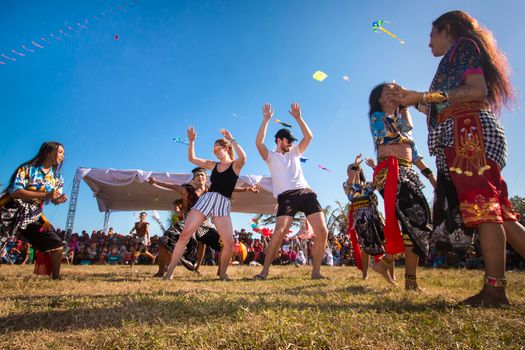 Vibrant cultural dance festival in West Java, highlighting diverse traditions and joyful community interaction.