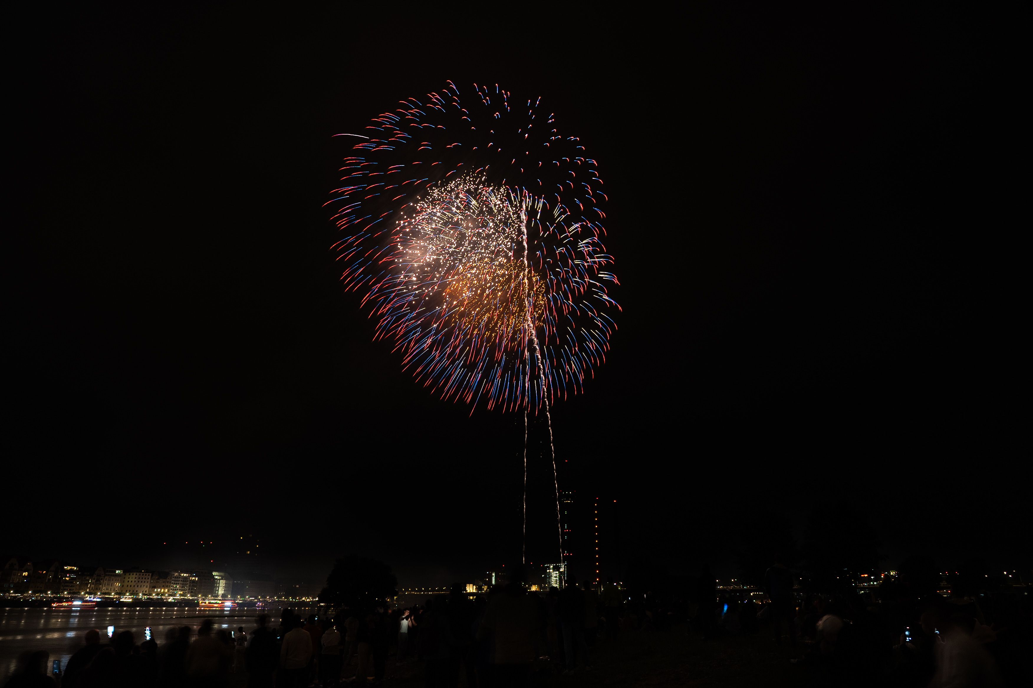 Vibrant Fireworks Display Over City Skyline at Night · Free Stock Photo