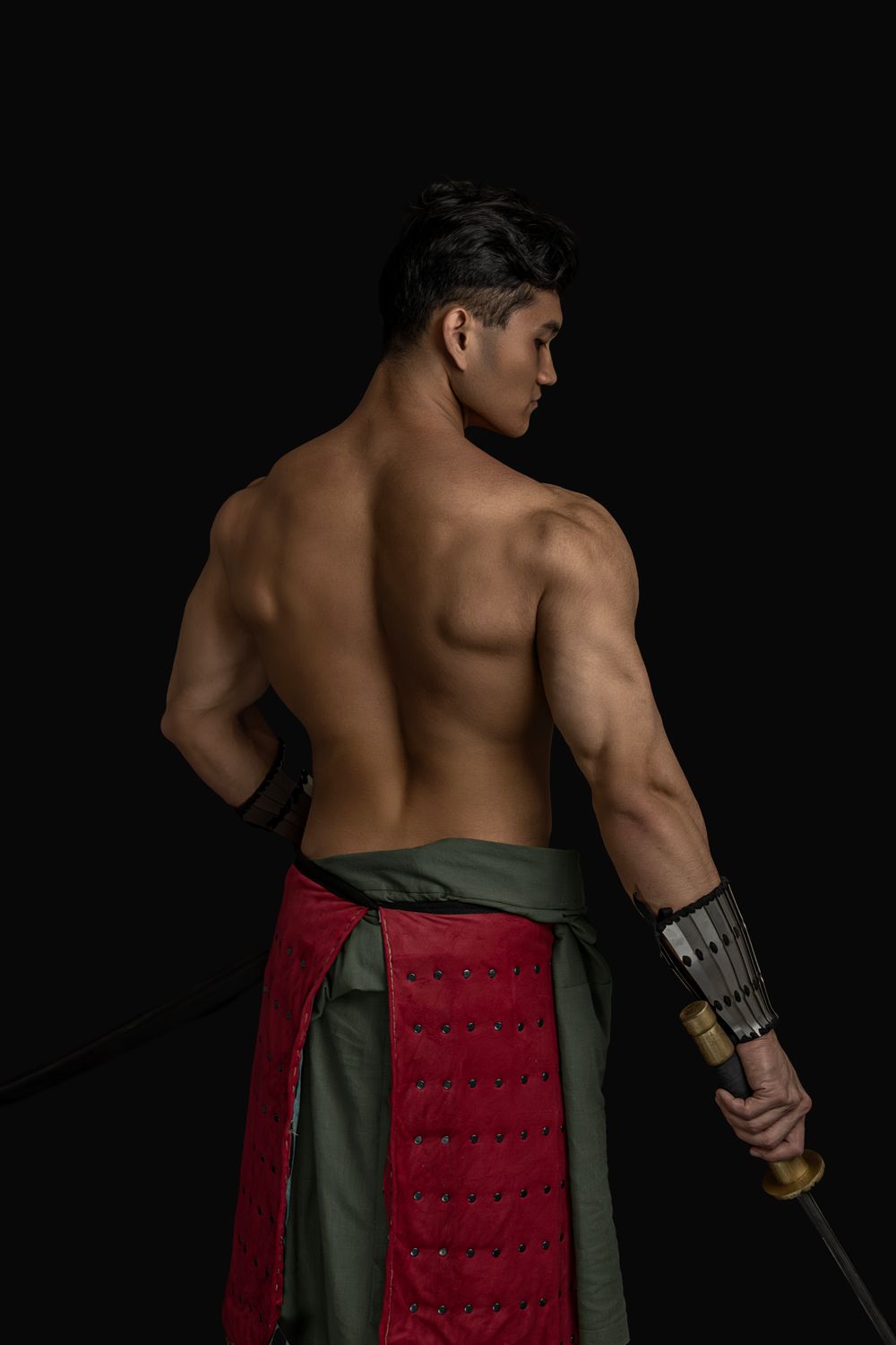 Back View of Warrior with Sword and Armor · Free Stock Photo