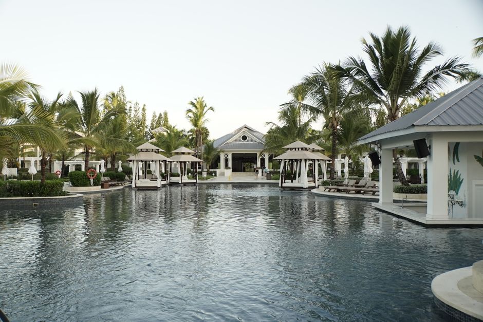 Resort-style pool deck with luxury cabanas and skyline views - luxury apartments miami Resort-style pool deck with luxury cabanas and skyline views - luxury apartments miami