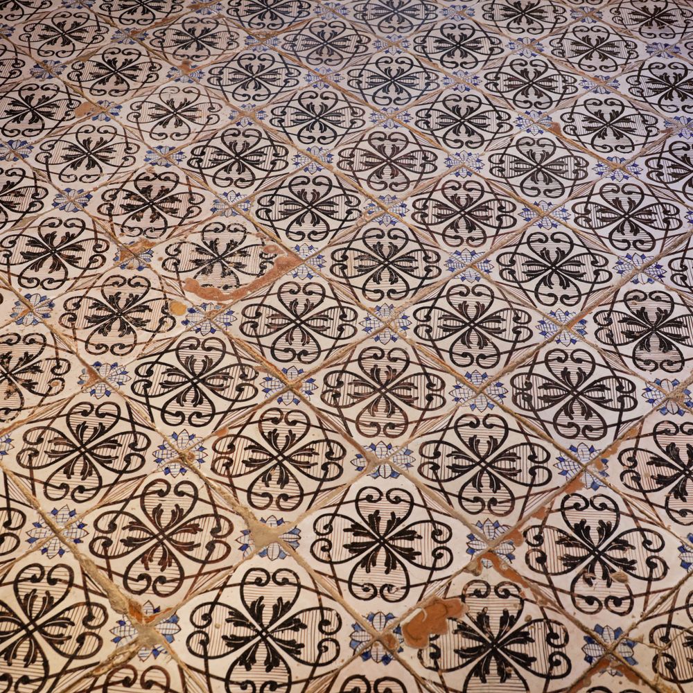 Wallpapering in Hampton Wick — clean edges cut in around trim and sockets