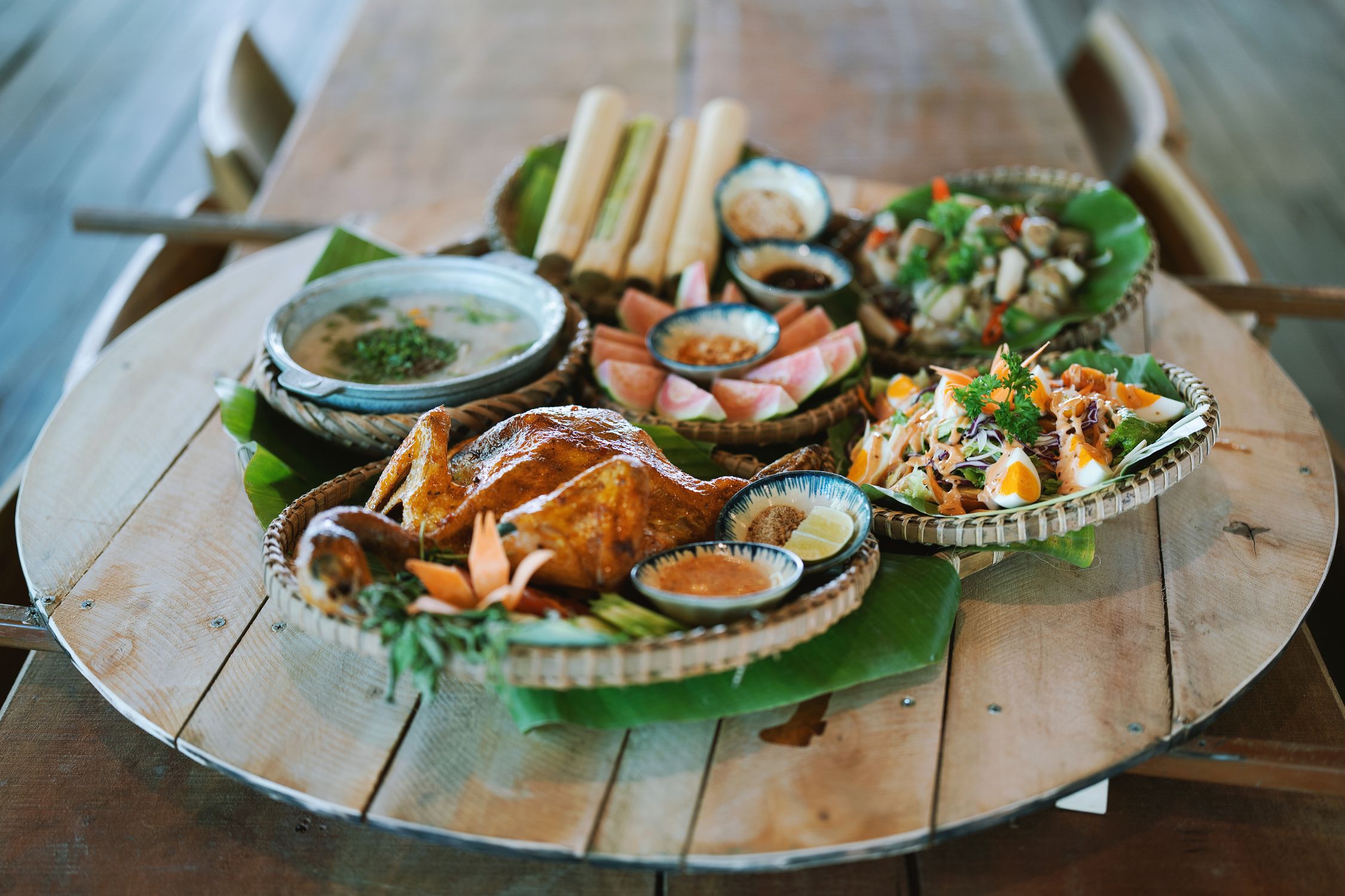 Traditional Asian Feast on Rustic Wooden Table · Free Stock Photo