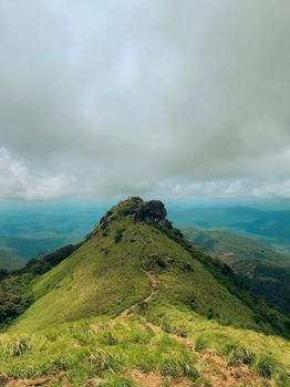 Discover the lush greenery and dramatic landscapes of Ranipuram Hill in Kerala's Western Ghats.