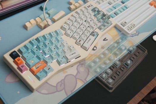 Colorful custom mechanical keyboard layout on a vibrant desk mat featuring playful designs.
