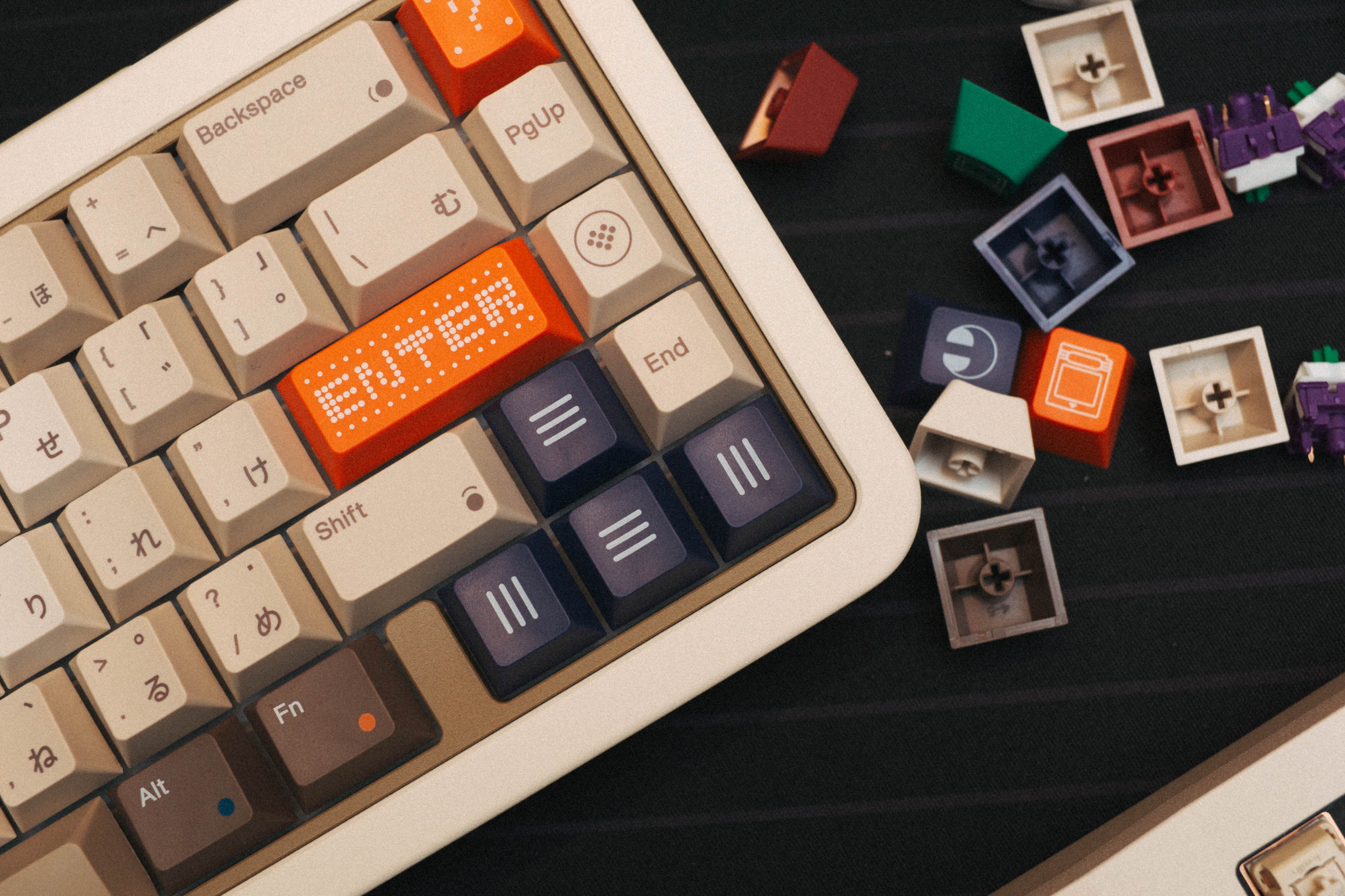 Close-up of Mechanical Keyboard with Custom Keycaps · Free Stock Photo