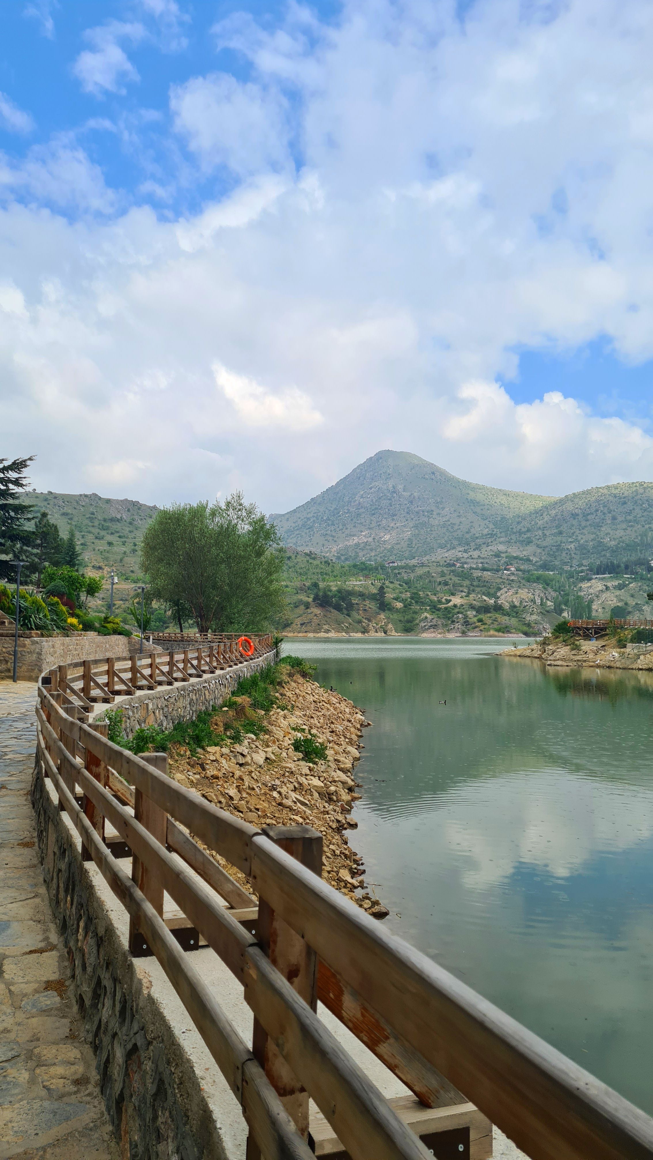 Scenic Mountain Lake and Wooden Pathway · Free Stock Photo