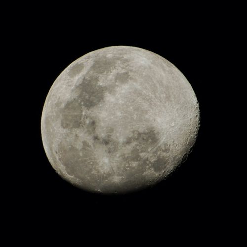 Free A detailed close-up of the full moon against a clear night sky. Stock Photo