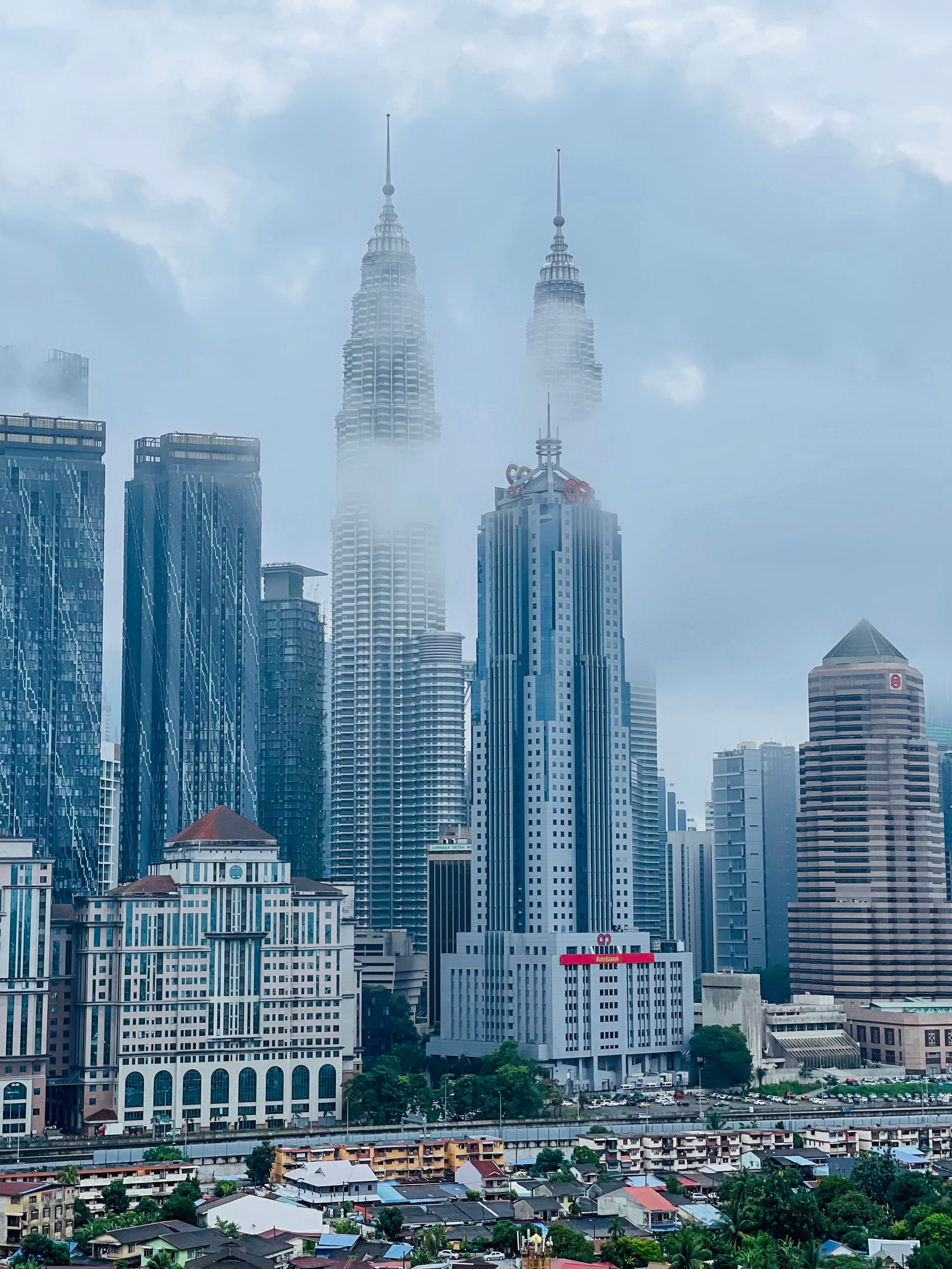 Kuala Lumpur skyline in mist