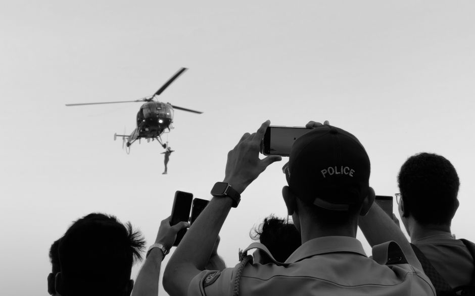 person recording police with phone