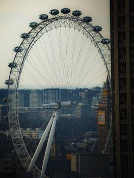 Striking view of the London Eye and Big Ben, capturing London's iconic cityscape.