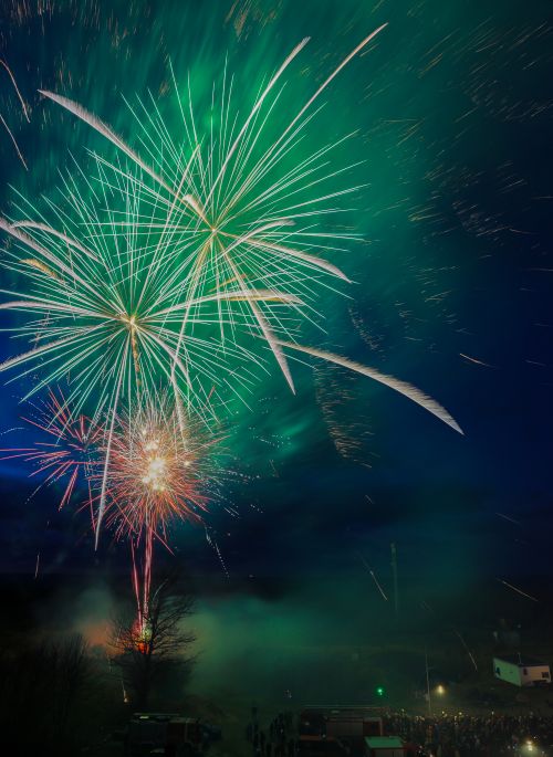 Free Stunning fireworks light up the night sky in Putgarten, Germany, celebrating New Year's Eve. Stock Photo