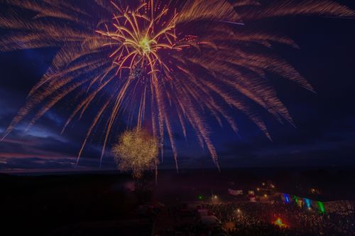 Free Vibrant fireworks light up the night sky during New Year's Eve in Putgarten, Germany. Stock Photo