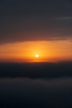 Breathtaking sunrise scene with warm colors over a tranquil ocean horizon, inspiring serenity.