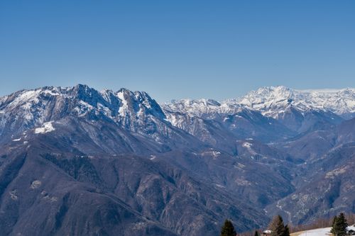 Free Stunning snowy peaks of the Swiss Alps under a clear blue sky. Stock Photo