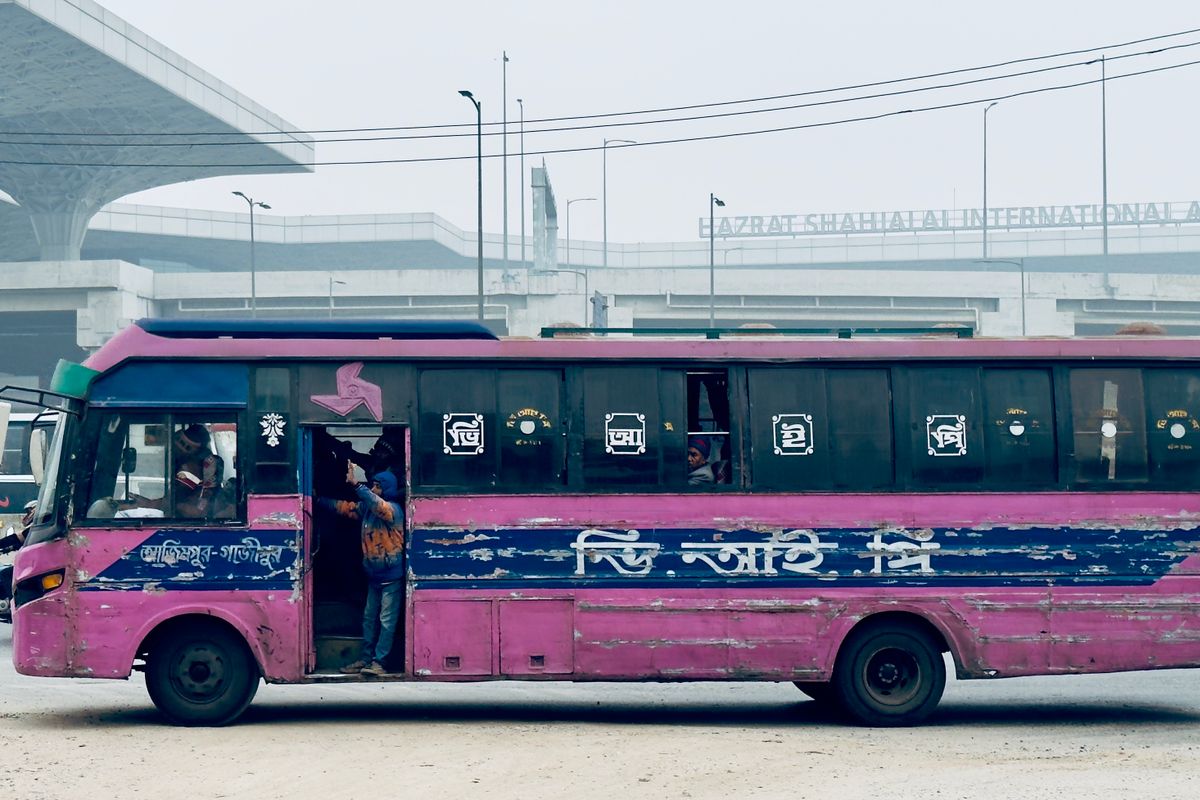 Bus waiting at an airport transport stop