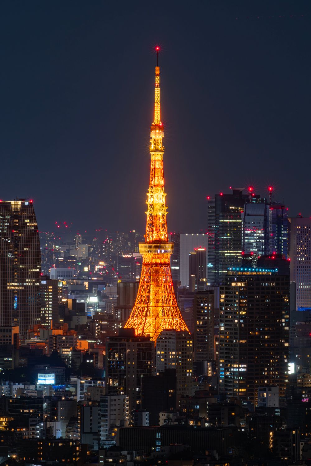 Illuminated Tokyo Tower at Night: Aerial Metropolis View · Free Stock Photo