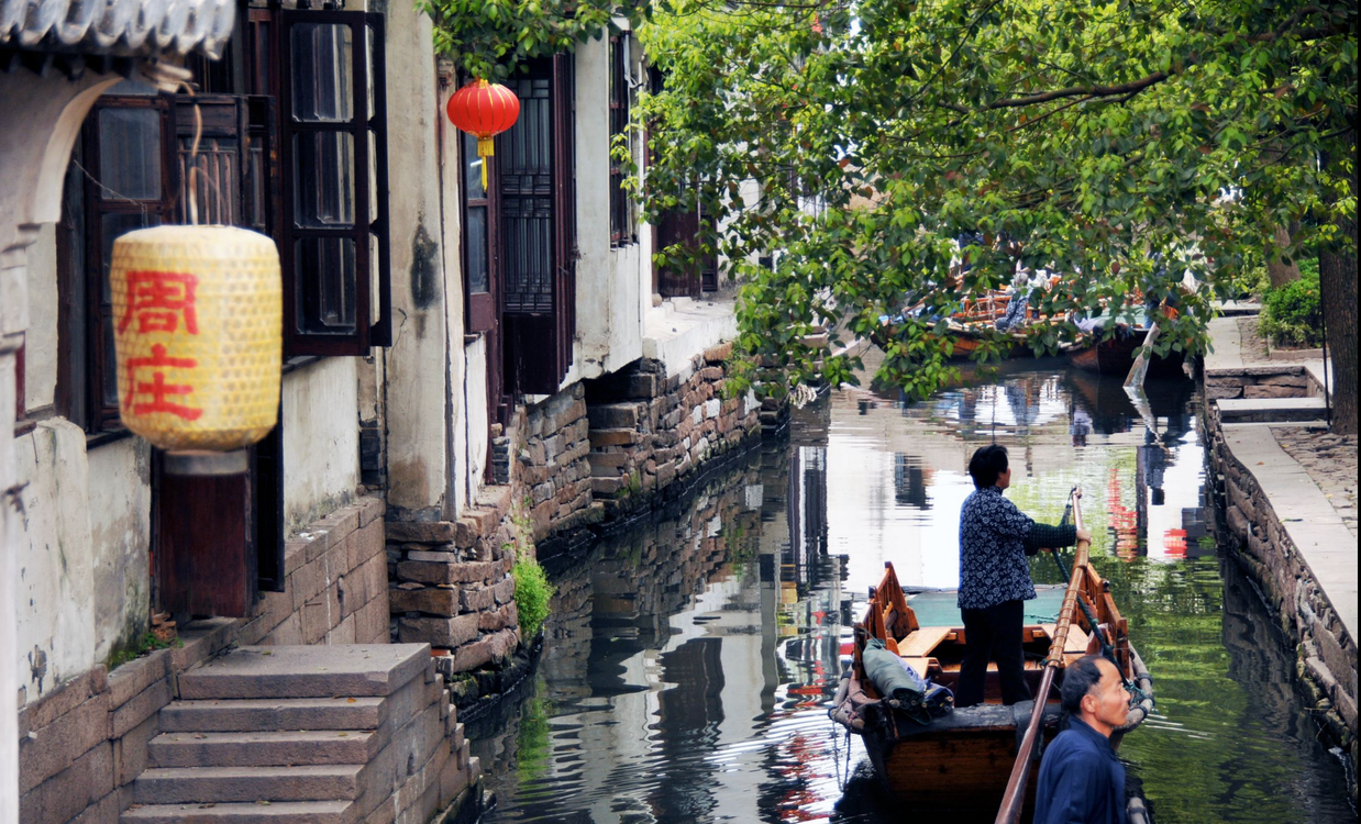 Traditional Boat Ride in Ancient Chinese Water Town · Free Stock Photo