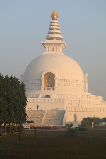 The Vishwa Shanti Stupa captures the serene beauty of sunrise with its iconic architecture.
