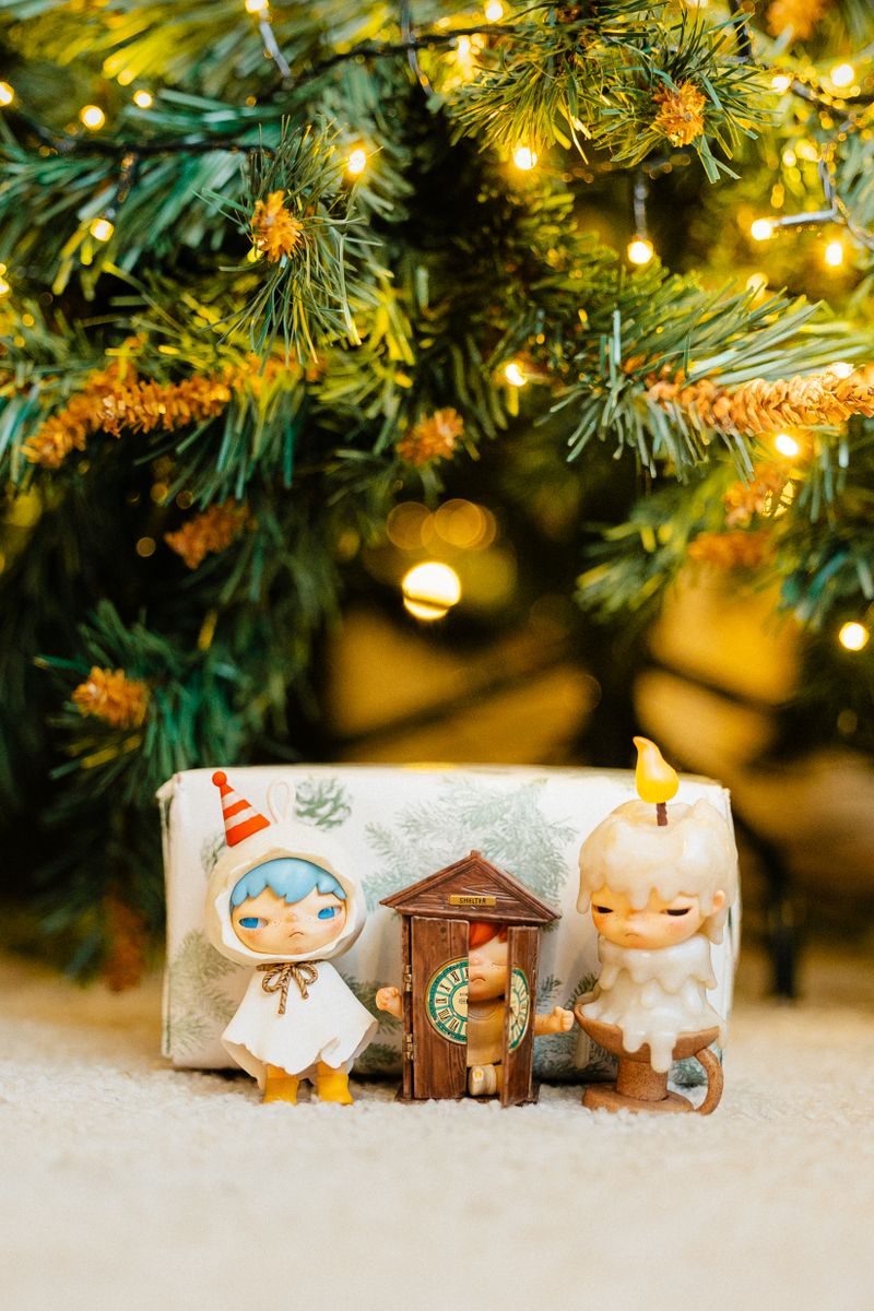 Cute figurines arranged under decorations illustrating collectible toy industry reports and art toy market statistics