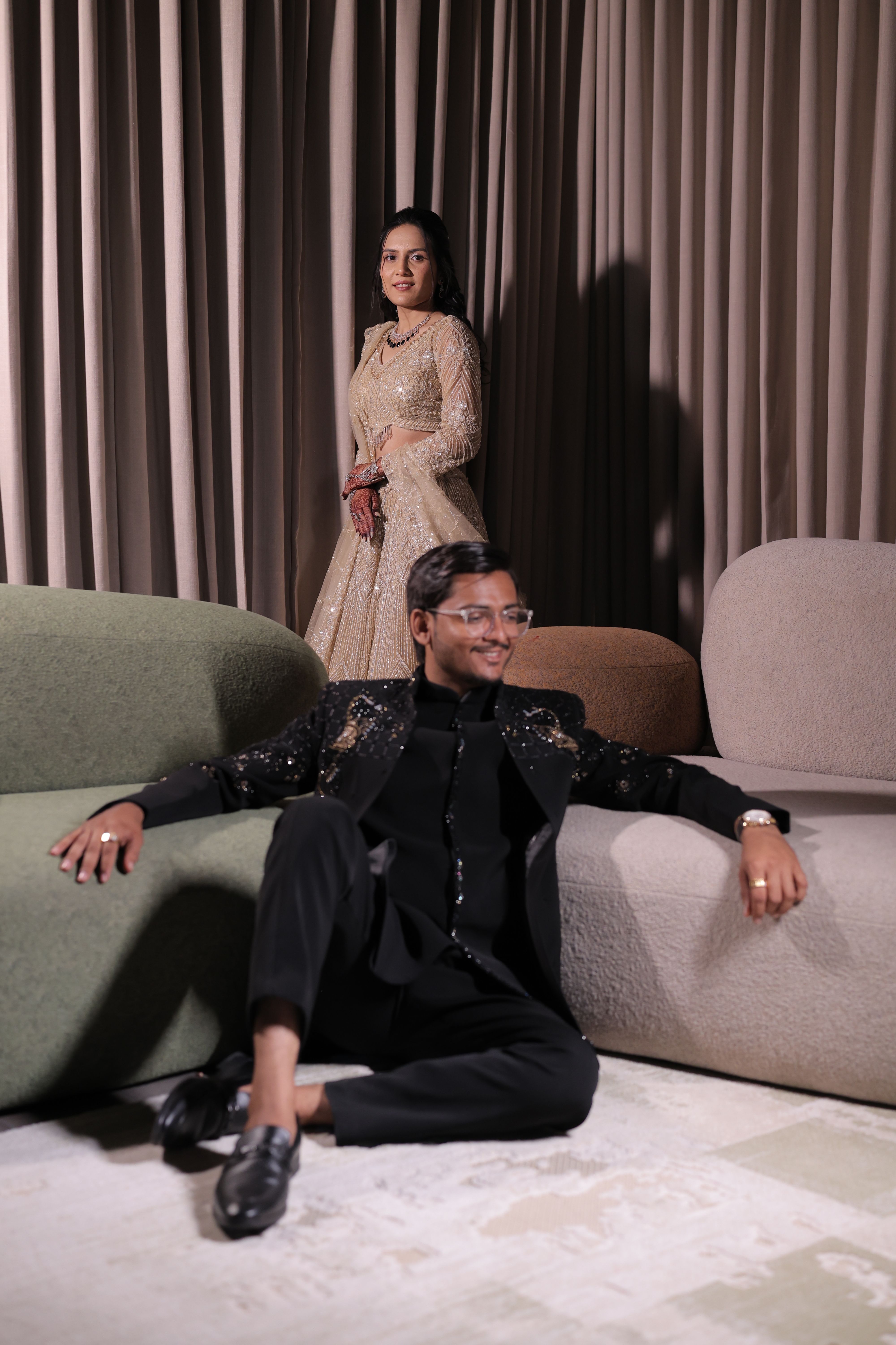 Elegant Couple Posing in Stylish Indoor Setting · Free Stock Photo