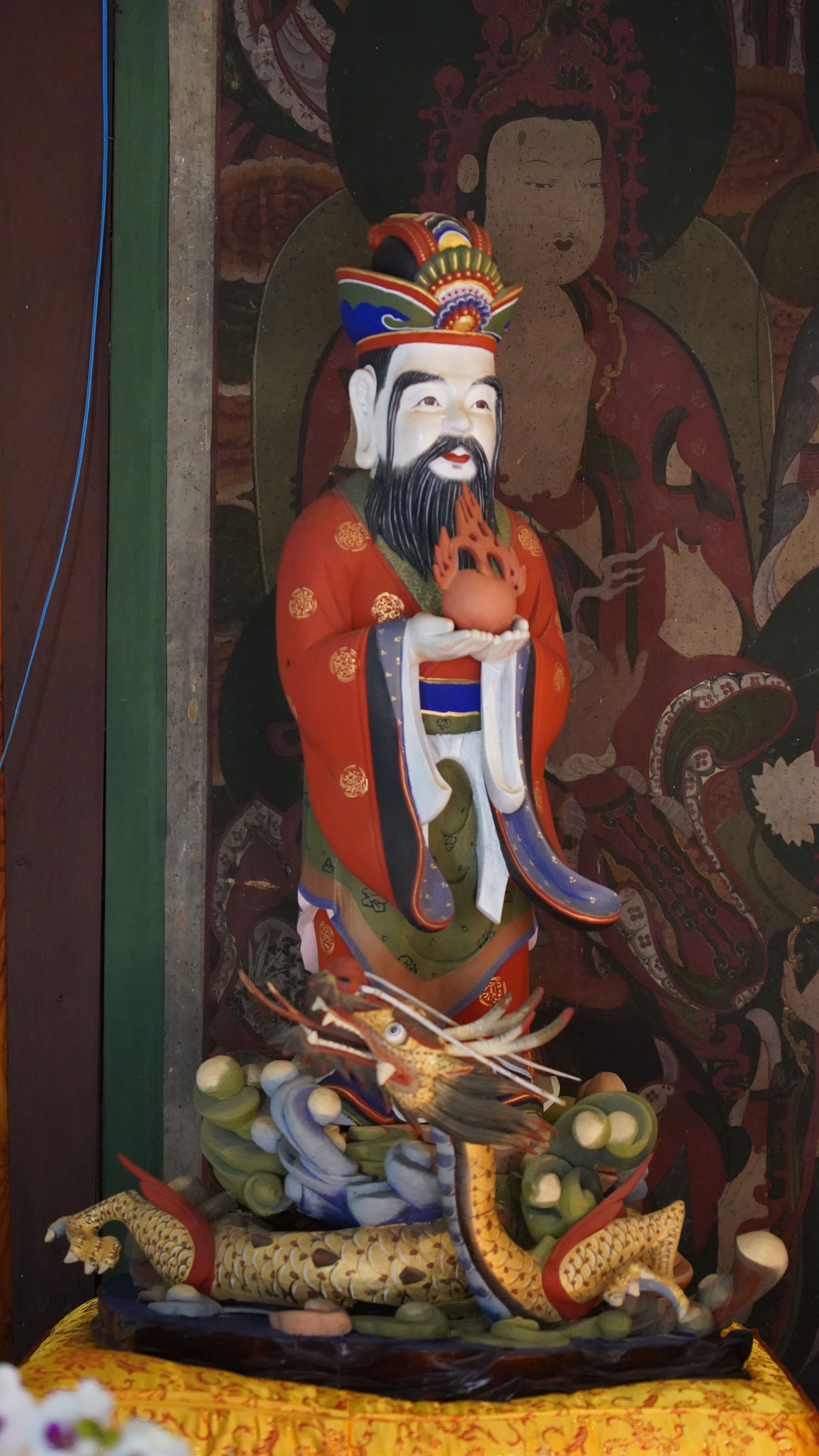 Vivid Buddhist statue depicting an ancient figure in Korean temple, 경상북도.