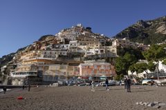 Colorful cliffside village above a pebble beach on the Amalfi Coast