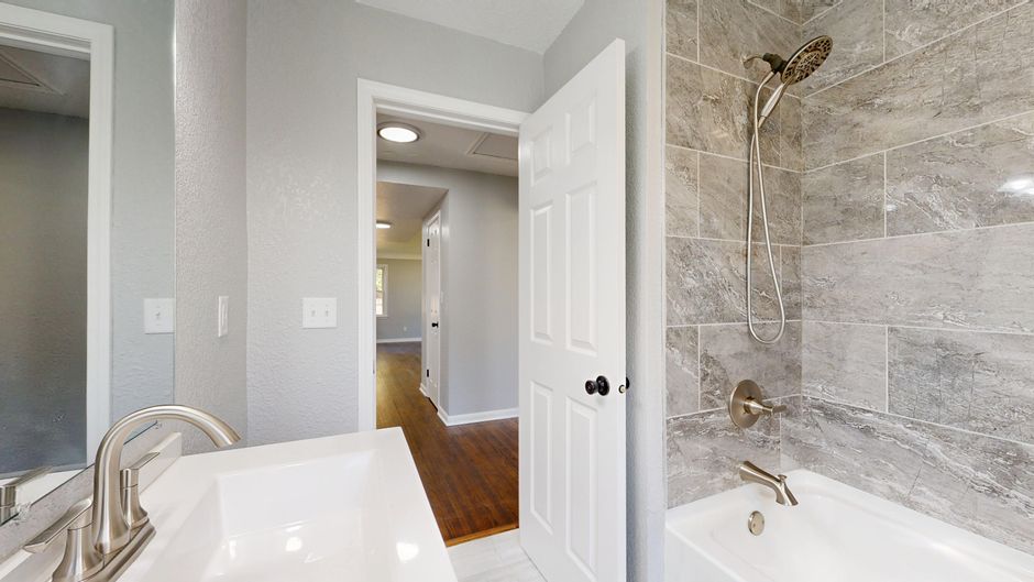 Completed bathroom renovation with new shower in Greater New Orleans