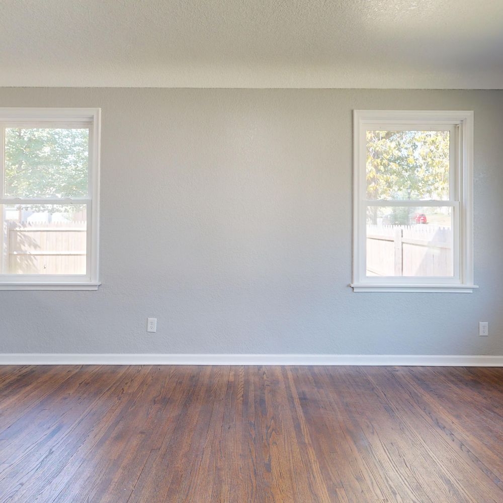 Raymond's Hill — professional movers carrying furniture on a house move