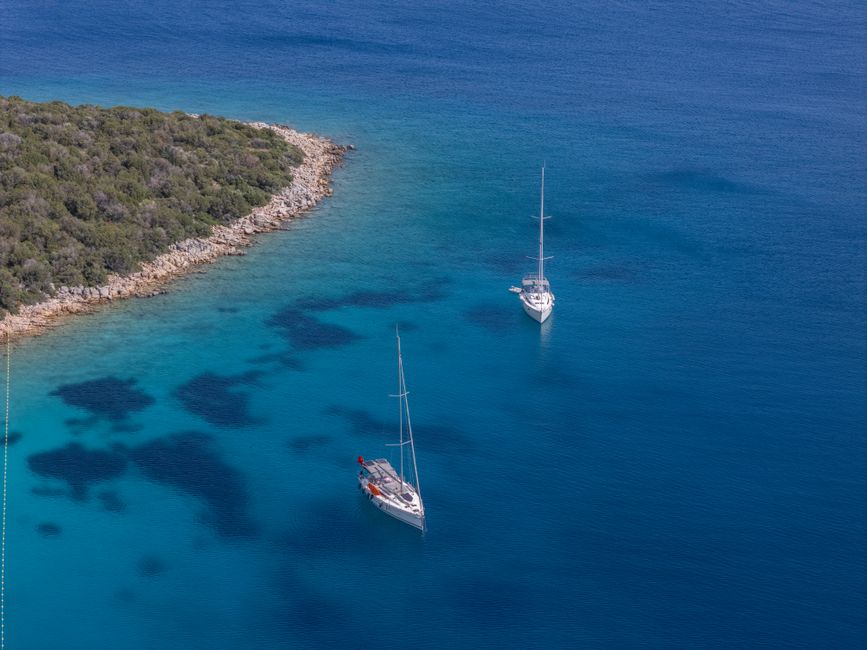Stunning Private Daysail - Road Town to Norman Island Review: The Ultimate British Virgin Islands Yacht Charter Experience Review 2026 - Captivating aerial view of two yachts anchored near lush coastlines in Bodrum, Türkiye, showcasing the stunning turquoise sea.
