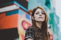 Shallow Focus of Woman Wearing Black and White T-shirt