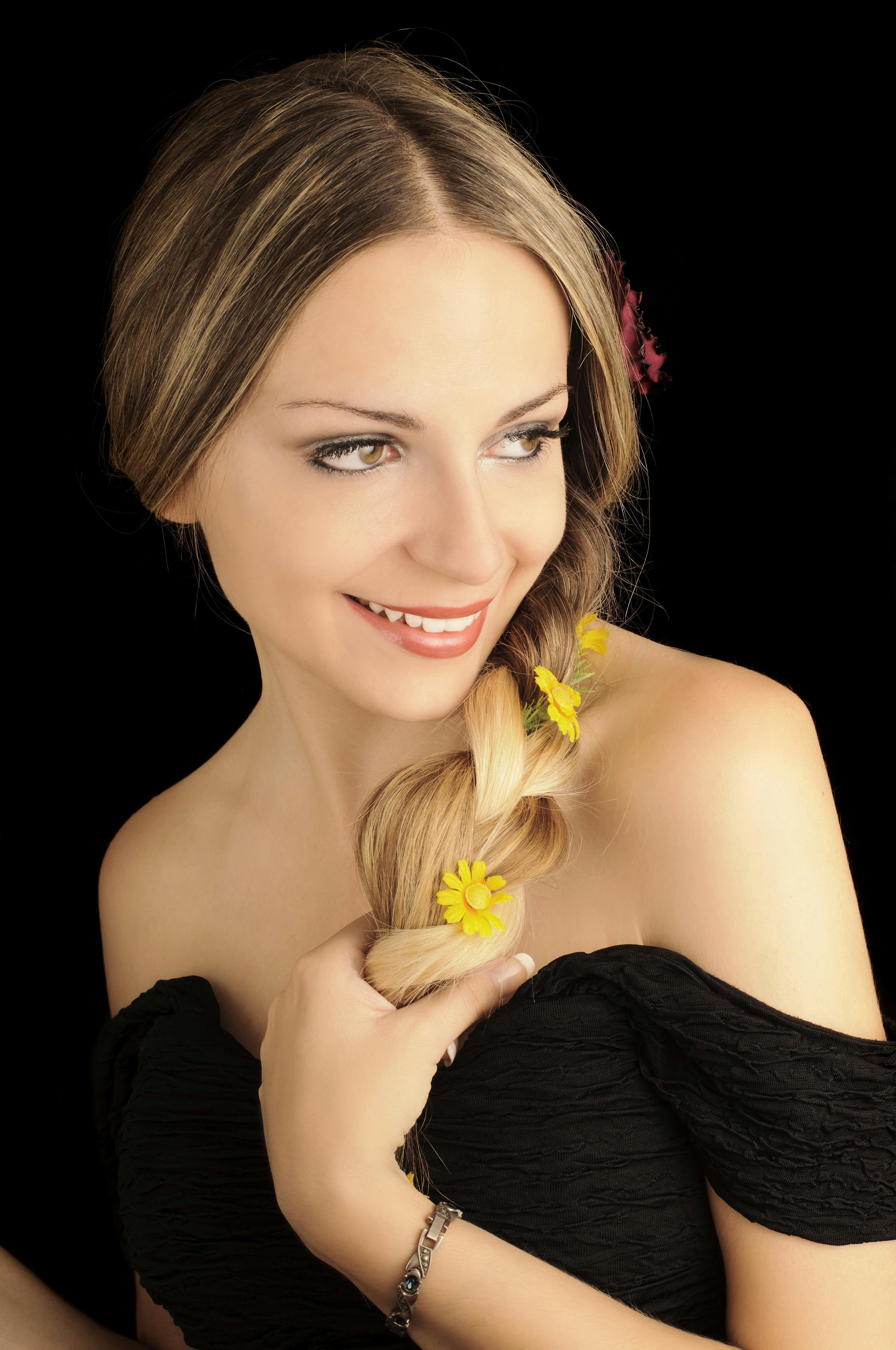 Woman Wearing Black Dress Sitting on Sofa \u00b7 Free Stock Photo