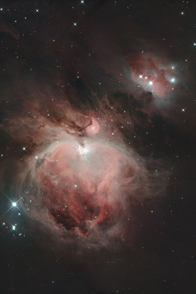 A breathtaking capture of the Orion Nebula showcasing vivid cosmic colors and stars.