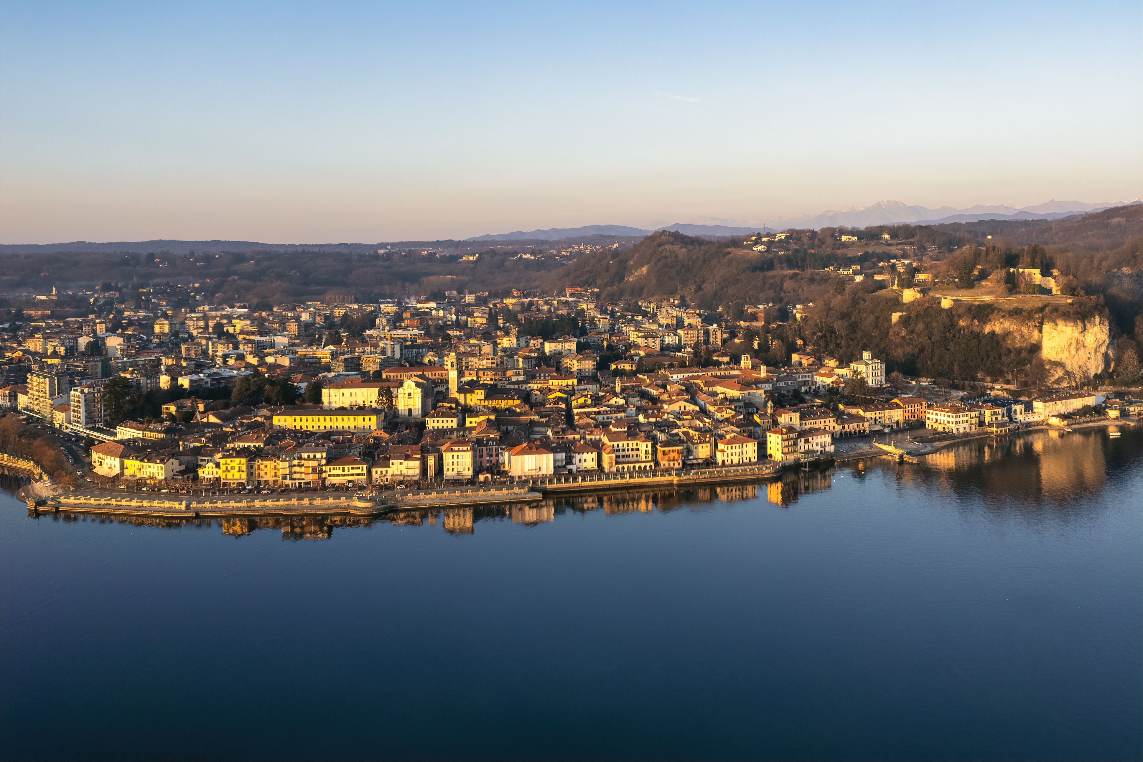 aerial-view-of-arona-on-lake-maggiore-at-sunset-free-stock-photo