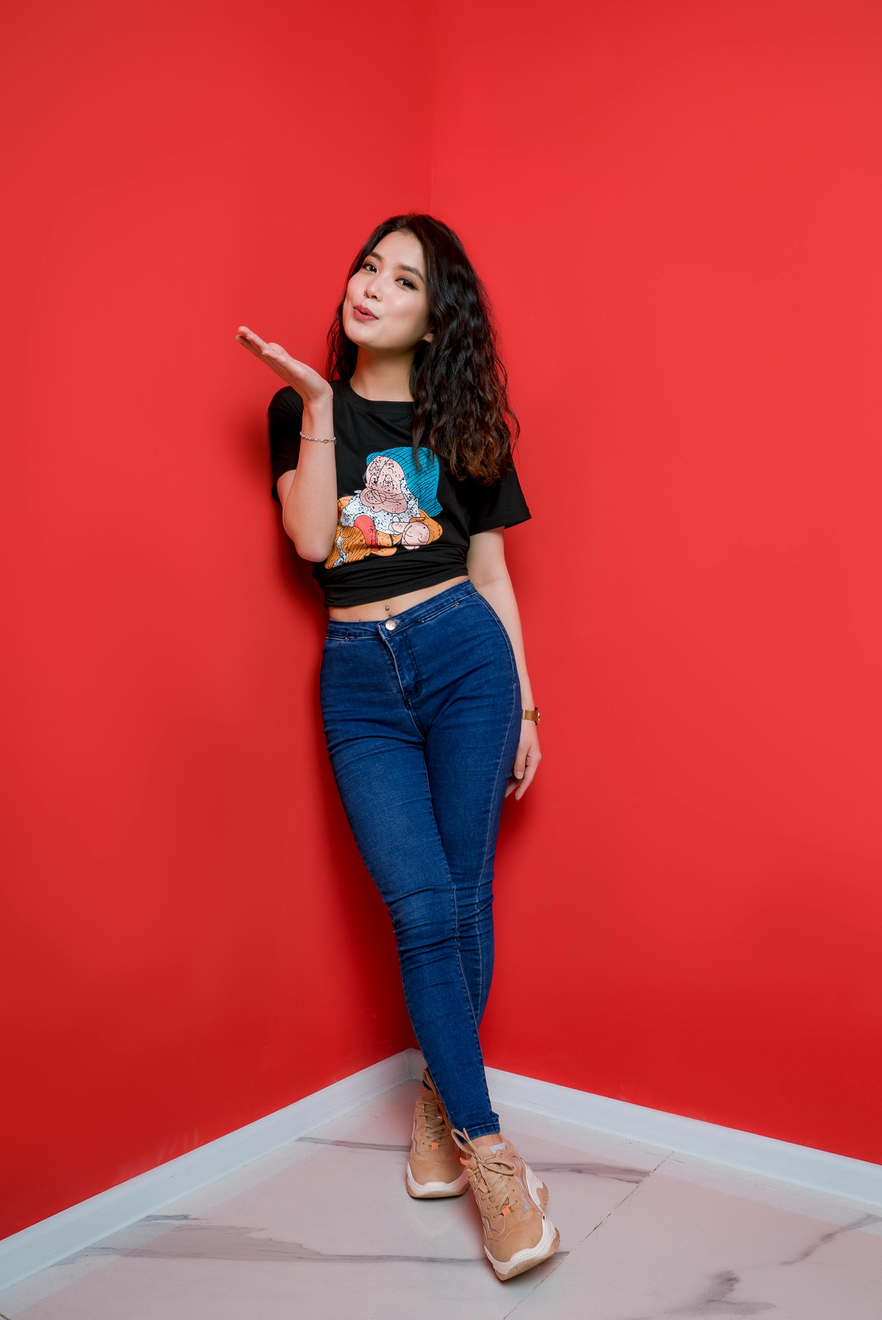 red crop top with black jeans