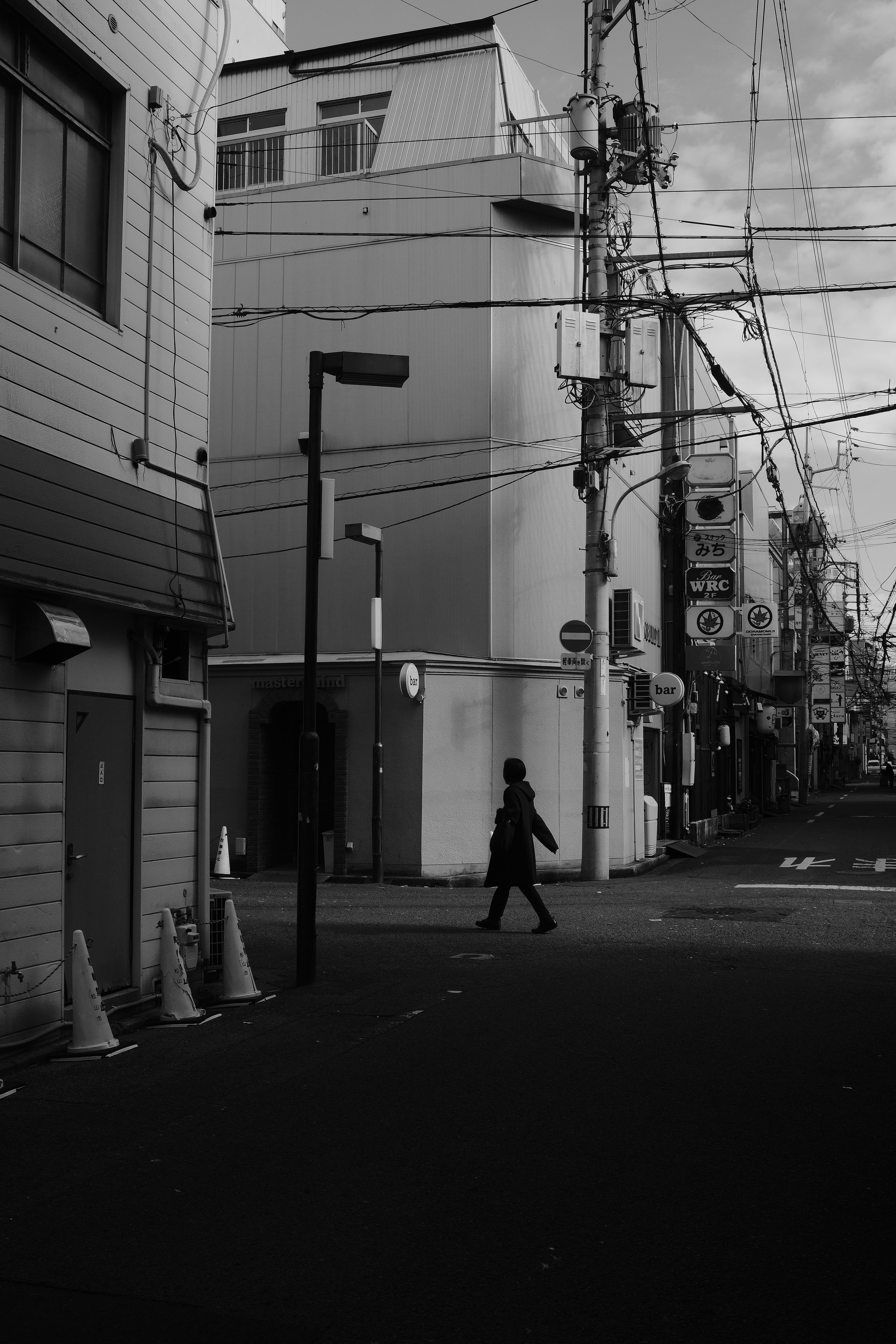 Black and White Urban Street Scene with Pedestrian · Free Stock Photo